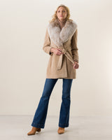Woman wearing Alpaca Blend Wrap Short coat with Oversized Finland Fur Shawl Collar in Blonde