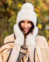 Model wearing Lusso mink hat and mittens in ivory
