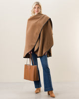 Woman Wearing Alpaca Wool Cape with Leather trim in camel color