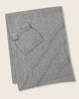 Cable knit baby blanket and pom-pom hat set in light grey