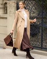 Model walking down a street wearing Marceau Baby Camel Hair Trench Coat in camel