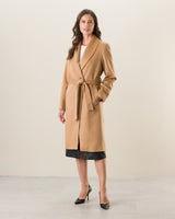 Woman wearing Carmela Belted Wrap cashmere Coat in camel