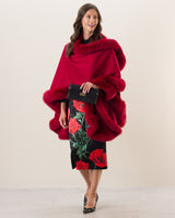 Woman Wearing Fur Trimmed cashmere Cape in red