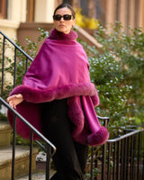 Woman walking down porch steps and wearing a berry cervinia
