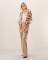 woman wearing elegante in camel