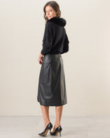 Woman wearing Boatneck Sweater with Finnish Fur collar in black