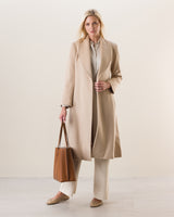 Woman Wearing Camel Hair Princess Coat in Blonde