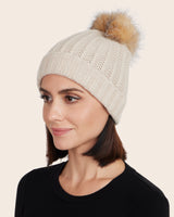 cuffed cashmere hat with pompom in oatmeal color