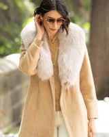 Woman wearing Alpaca Blend Wrap Short coat with Oversized Finland Fur Shawl Collar in BlondeWoman wearing Alpaca Blend Wrap Short coat with Oversized Finland Fur Shawl Collar in Blonde outdoors