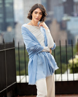 woman wearing Lightweight Cashmere Wrap in Sky Blue