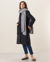 Woman wearing Voyage Cashmere Travel Wrap in grey