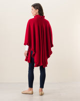 Woman Wearing Knitted Cashmere Cape in Red
