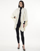 Woman wearing Knitted Cashmere Cape in Ivory