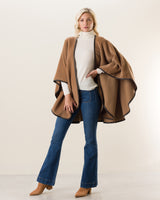 Woman wearing Alpaca Wool Cape with Leather trim in Camel