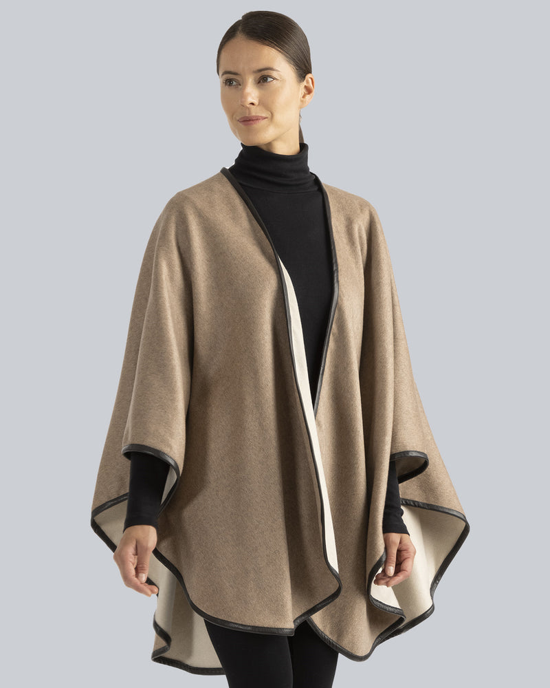 Woman Wearing Reversible Cashmere Cape with Leather trim in Oat/Beige