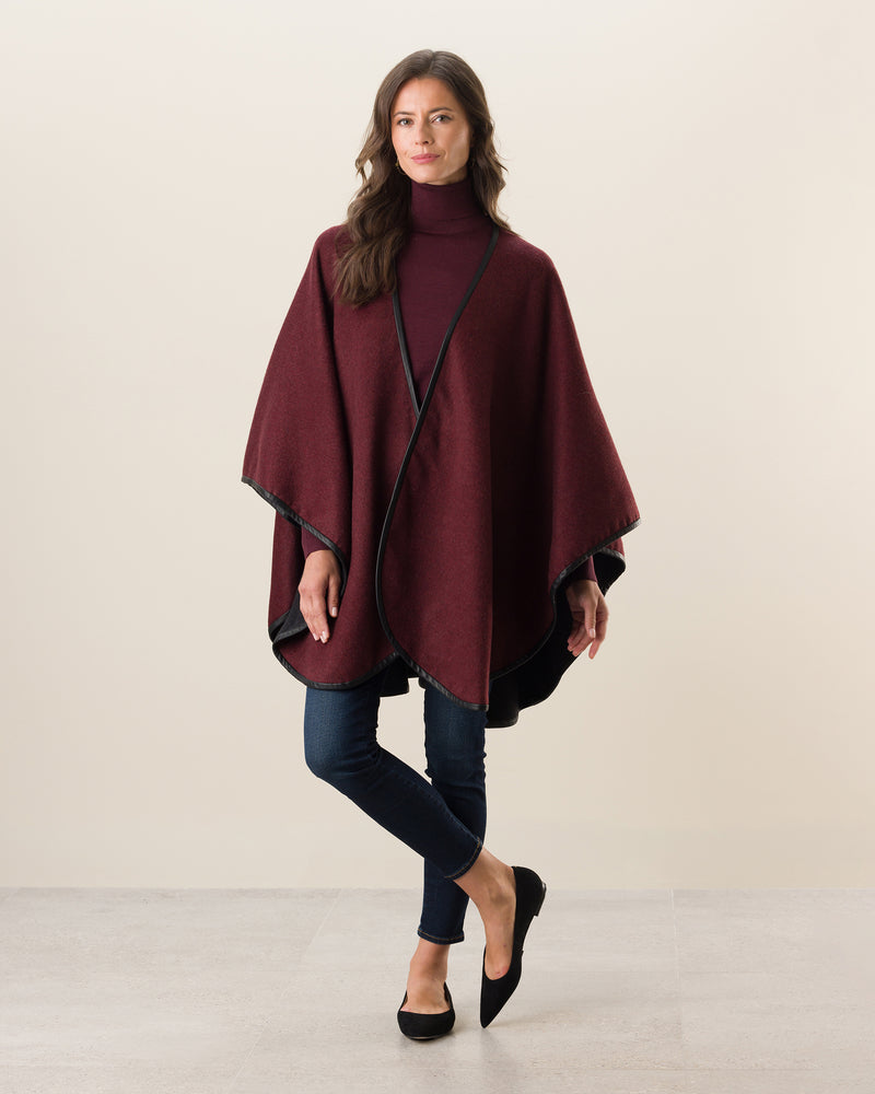 Woman Wearing Reversible Cashmere Cape with Leather trim in Deep Red/Charcoal