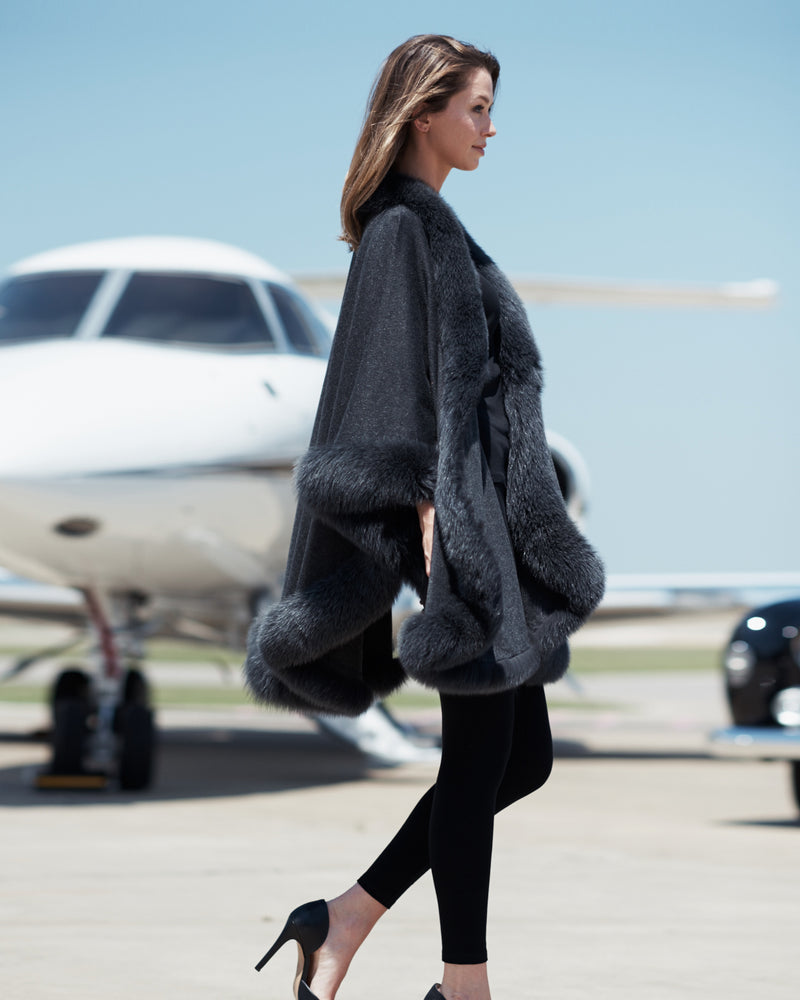 Model wearing Fur Trimmed Cape in Charcoal