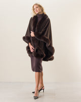 Woman wearing Fur Trimmed Cape in Brown