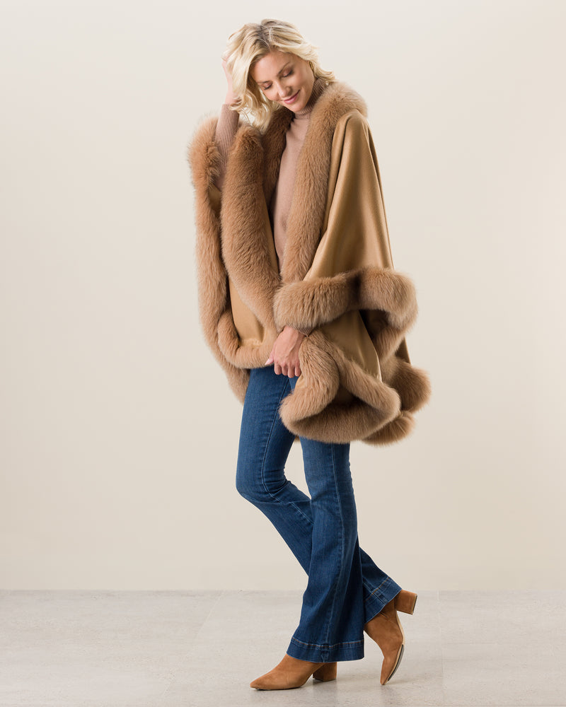 Woman Wearing Fur Trimmed Cape in camel