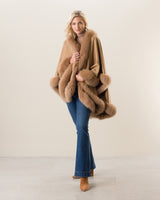 Woman wearing Fur Trimmed Cape in Camel