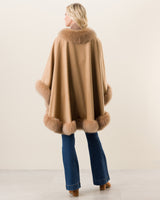 Woman wearing Fur Trimmed Cape in Camel