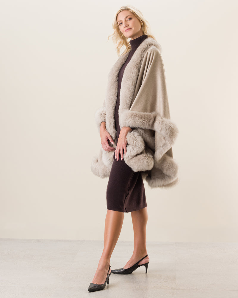 Woman wearing Fur Trimmed Cape in stone