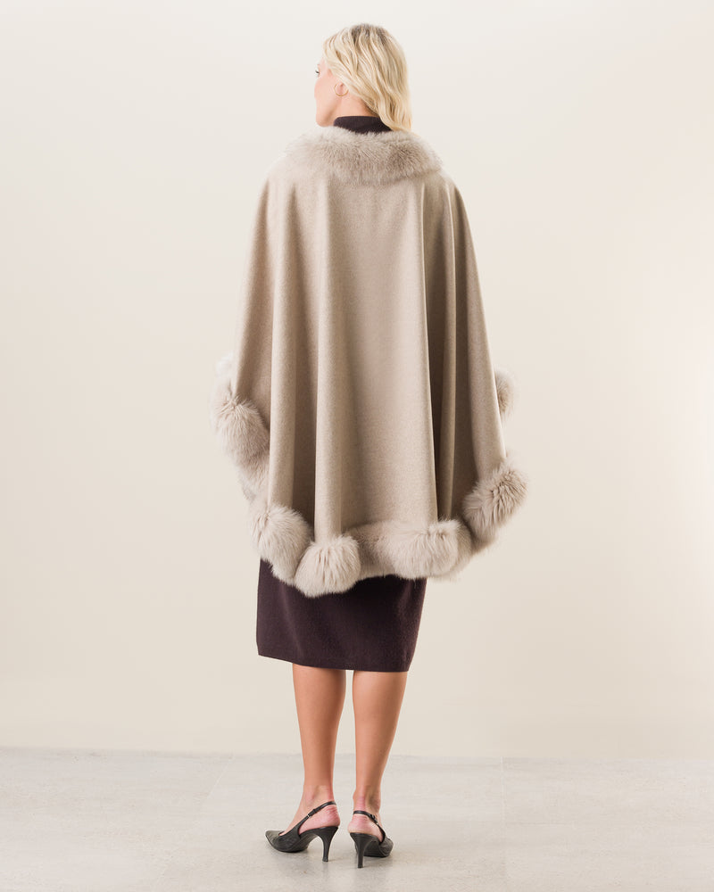 woman wearing Fur Trimmed Cape in stone