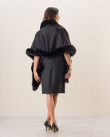 Woman wearing Fur Trimmed Cashmere Shawl in Black
