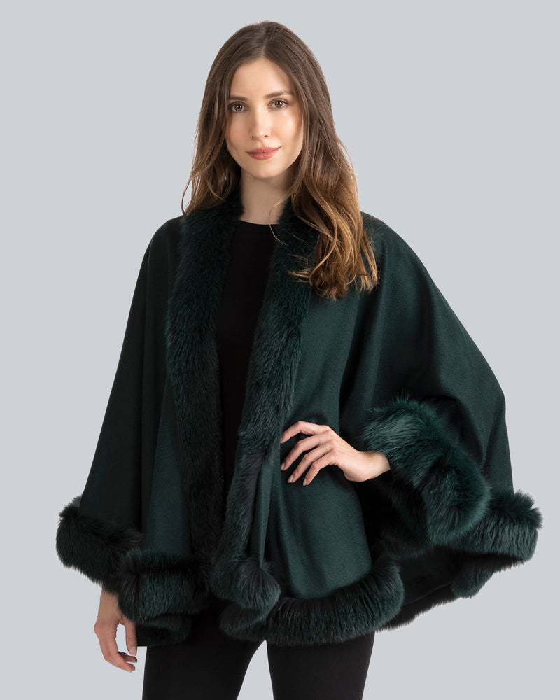 Woman Wearing Fur Trimmed Cashmere Cape Petite Length in emerald