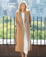 Woman wearing Cashmere Belted Shawl Collar Long Coat with Pick Stitching in Camel