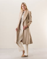 Woman Wearing Camel Hair Princess Coat in Blonde