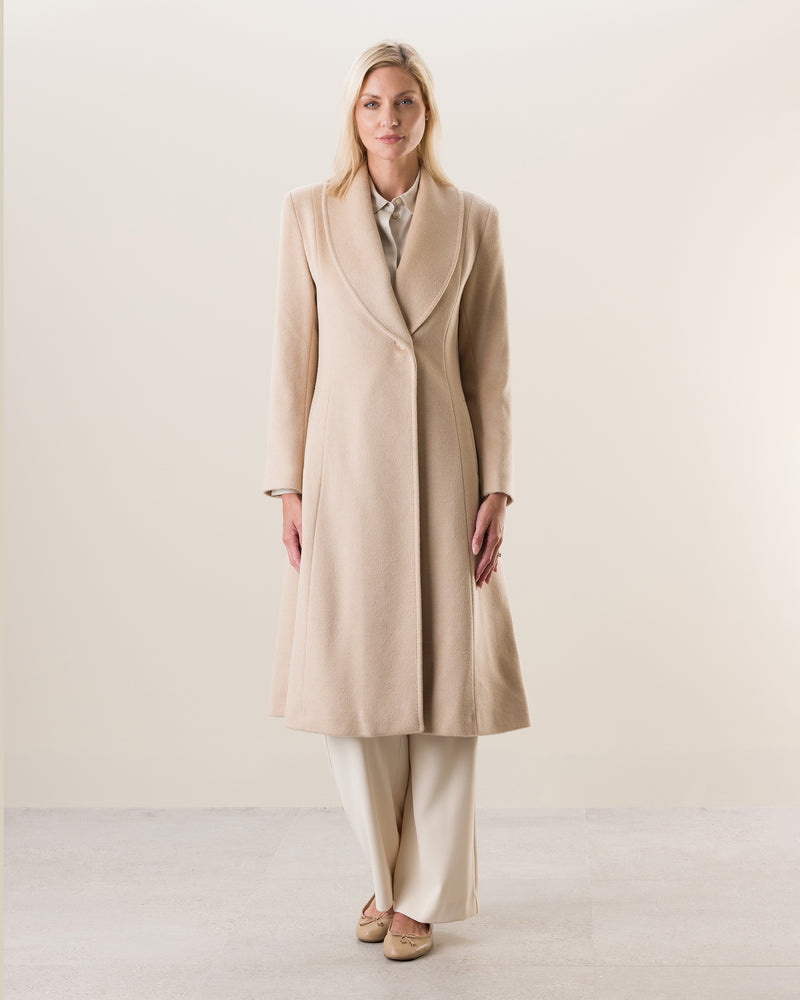 Woman Wearing Camel Hair Princess Coat in Blonde