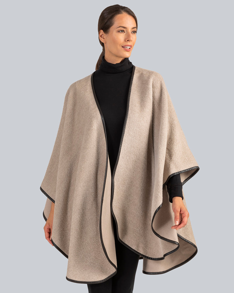 Woman Wearing Alpaca Wool Cape with Leather trim in Oatmeal