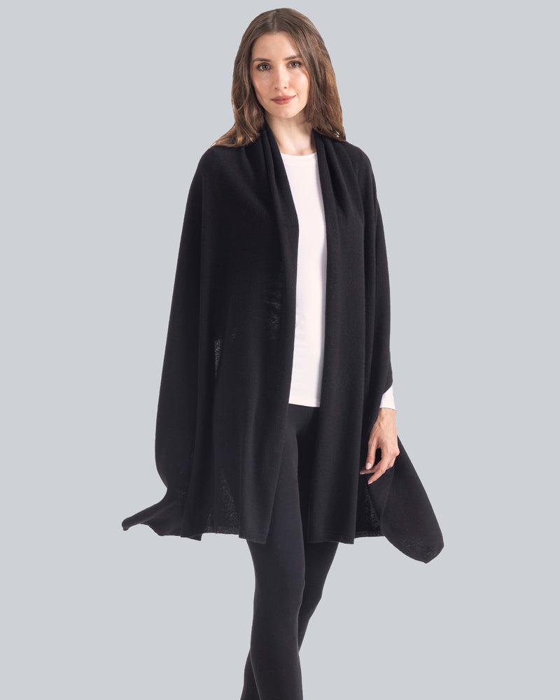woman wearing Voyage Cashmere Travel Wrap in black