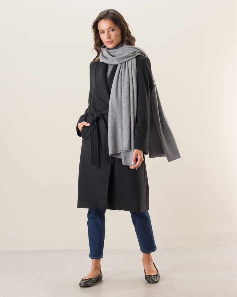 Woman wearing Voyage Cashmere Travel Wrap in grey