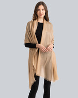 Woman wearing Lightweight Cashmere Wrap in  Soft Camel