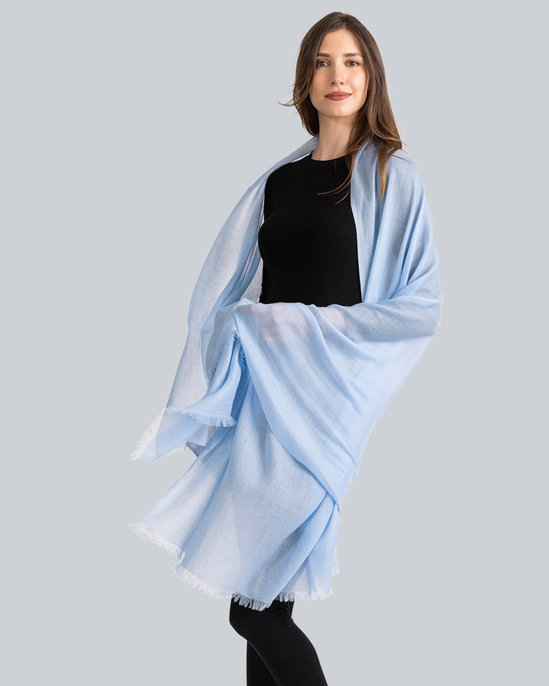 Woman wearing Lightweight Cashmere Wrap in Sky Blue