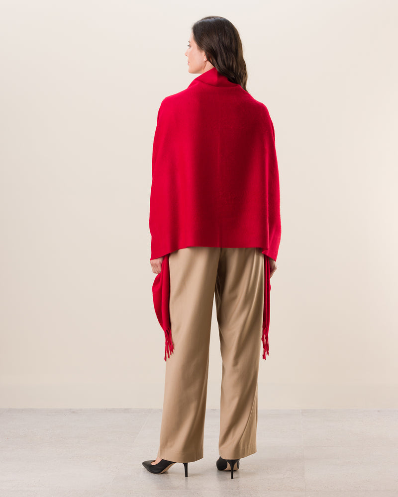 Woman wearing Cashmere water weave wrap with fringe in red