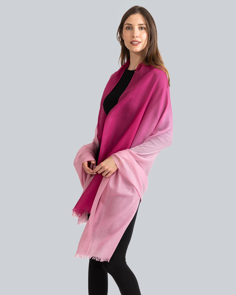 Woman wearing Lightweight Cashmere Wrap in pink ombre