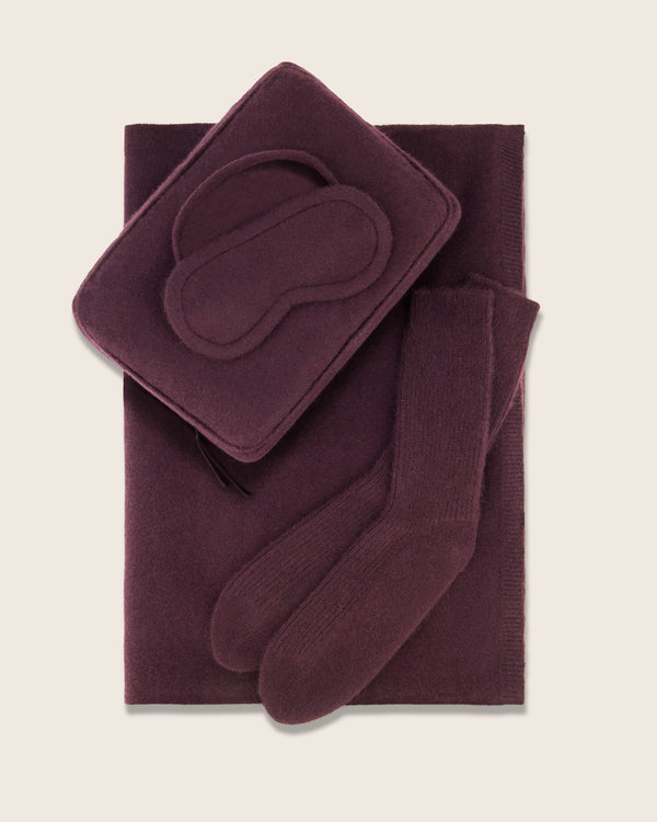 Aviano cashmere travel set in fig includes; eye mask, pillow, and socks 