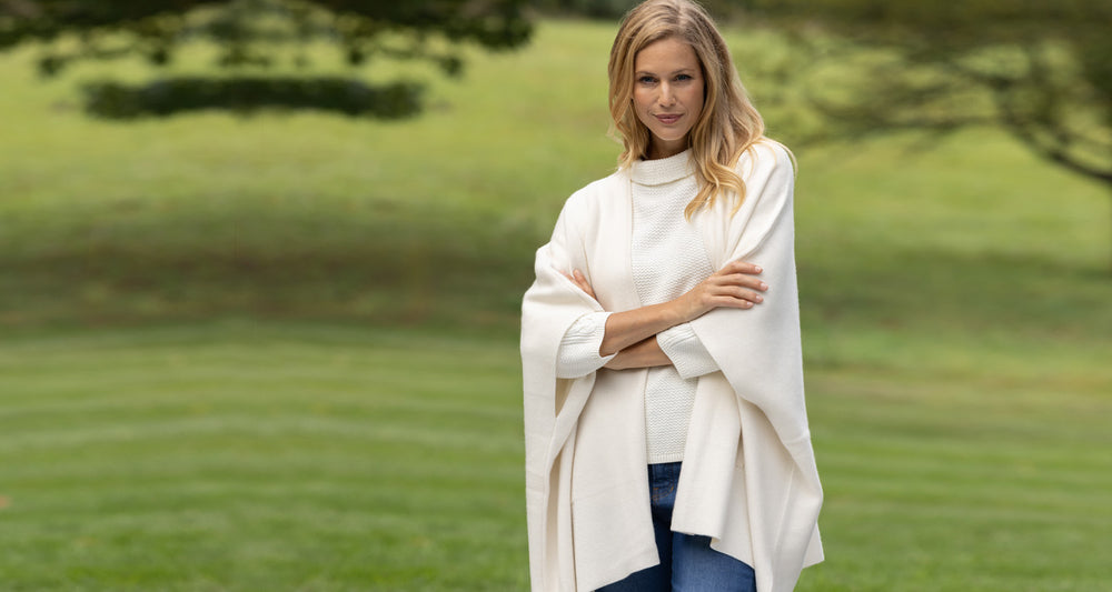 woman wearing ivory cashmere cape