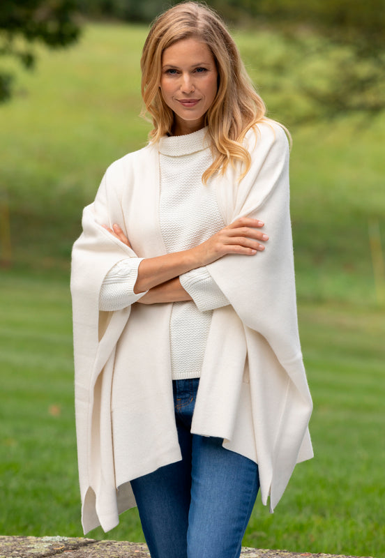 woman wearing ivory cashmere cape