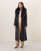 woman wearing Wool Cashmere Blend Maxi Wrap coat with Oversized Finland Fur Shawl Collar  in Black fur coat in black