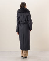 back view of woman in Wool Cashmere Blend Maxi Wrap coat with Oversized Finland Fur Shawl Collar  in Black