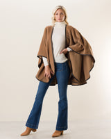 Woman wearing Alpaca Wool Cape with Leather trim in camel