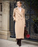 Model with her hand in her pocket wearing Marceau Baby Camel Hair Trench Coat in camel