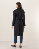back view of woman in carmela cashmere black belted wrap coat
