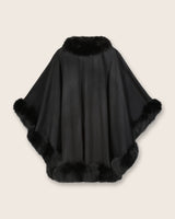 Back view of Cervinia cashmere cape with fur trim in black