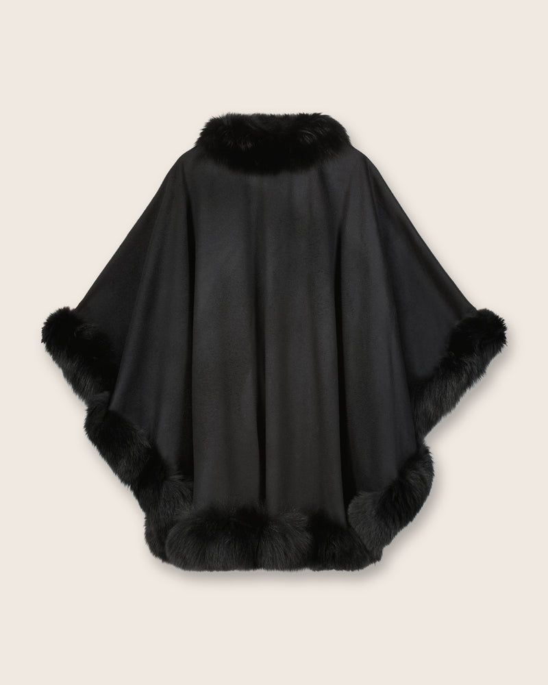 Back view of Cervinia cashmere cape with fur trim in black