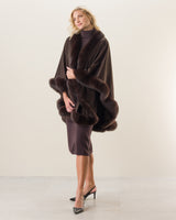 Woman wearing Fur Trimmed cashmere Cape in Brown